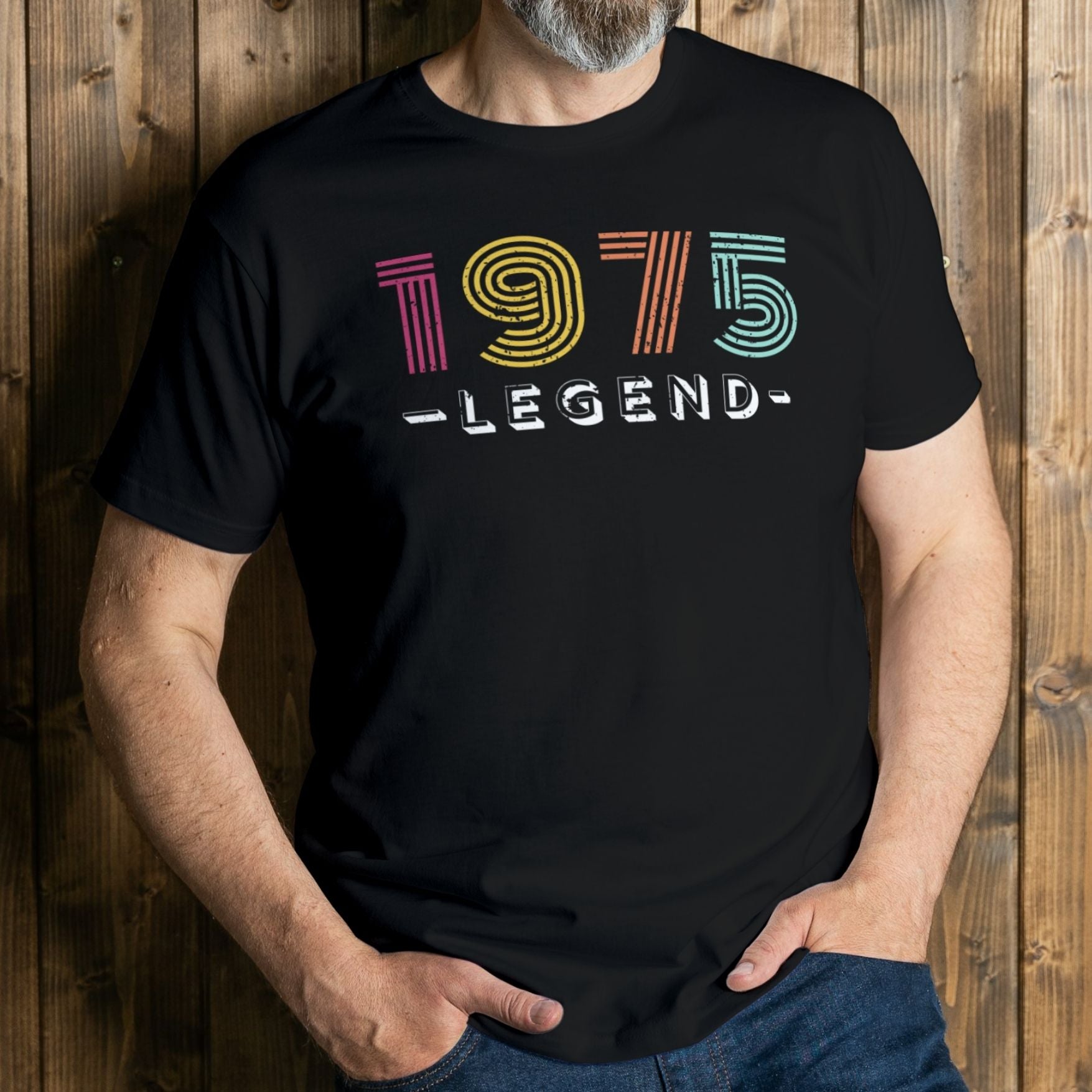 man wearing 1975 legend graphic tee
