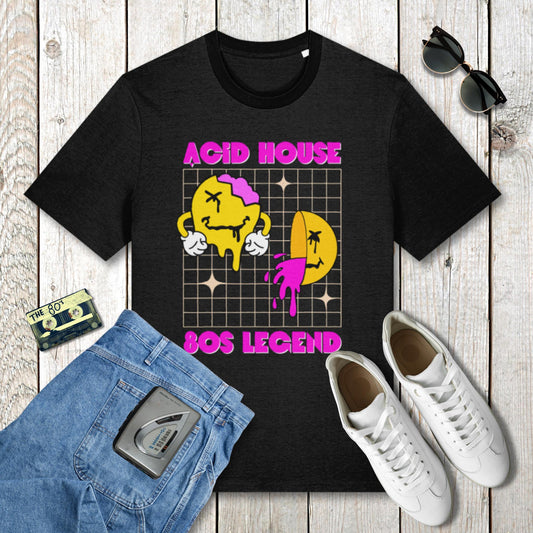 Black t-shirt with 'Acid House SOS Legend' design on a wooden surface with jeans, sneakers, and a cassette tape.