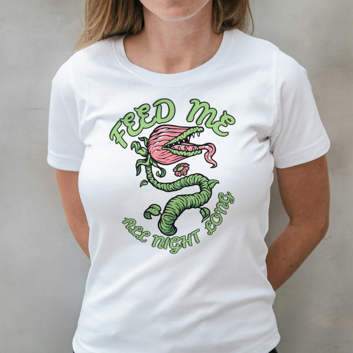 White t-shirt with a graphic design of a venus fly trap and text on a plain background