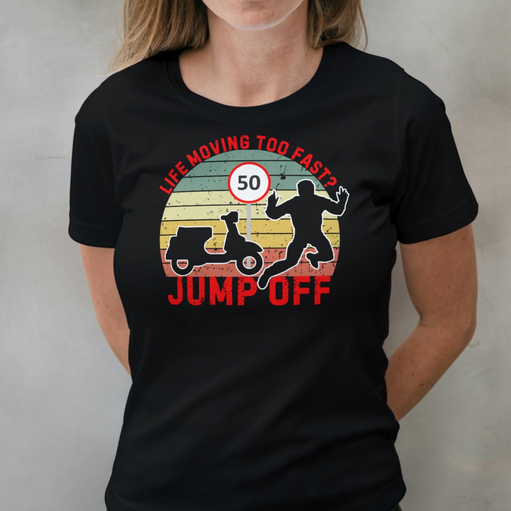Person wearing a black t-shirt with a graphic design and text.