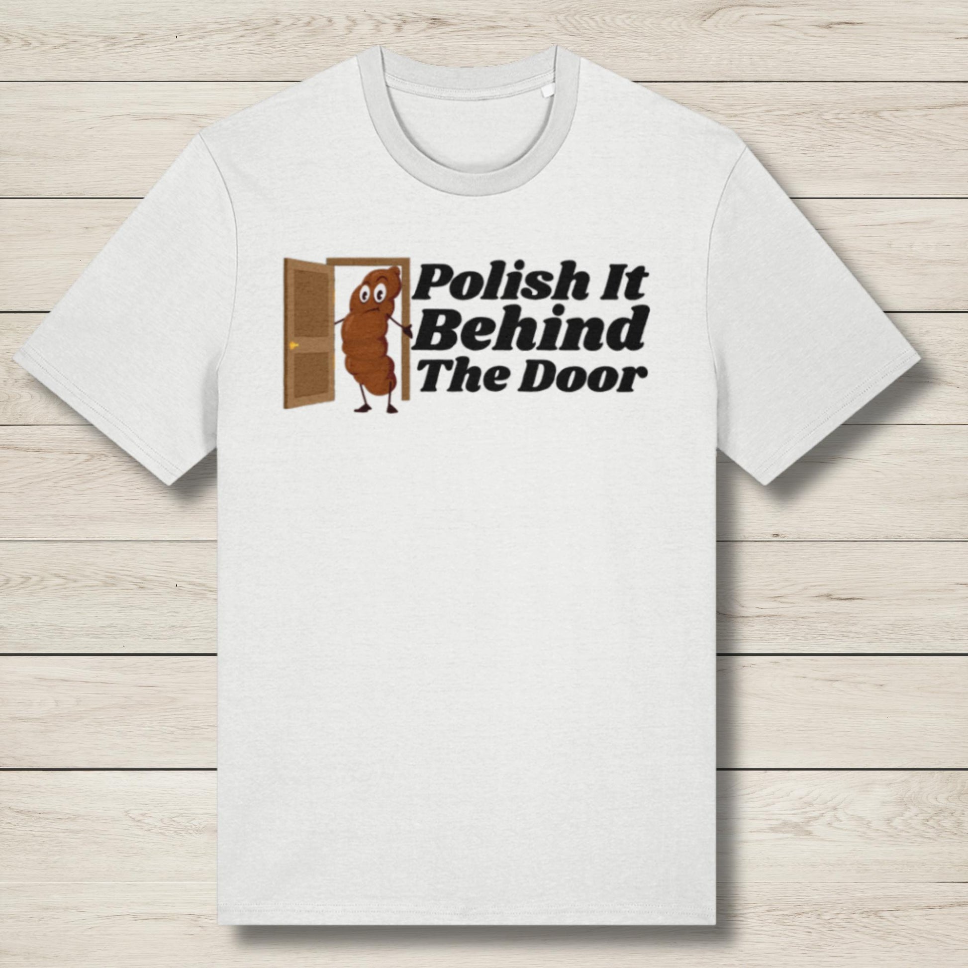 White t-shirt with a graphic design and text on a wooden surface
