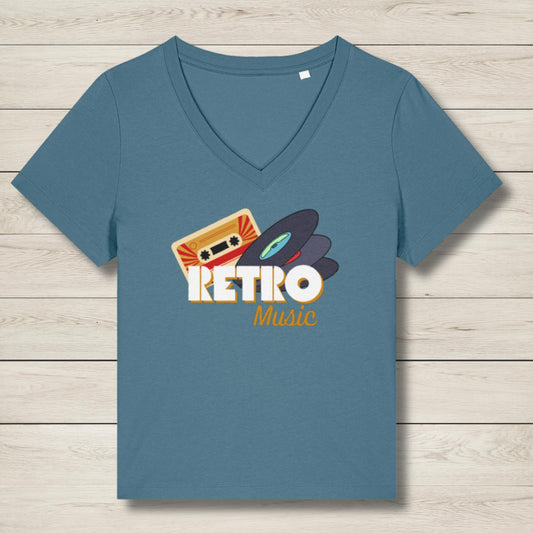 Blue t-shirt with 'Retro Music' design on a wooden surface