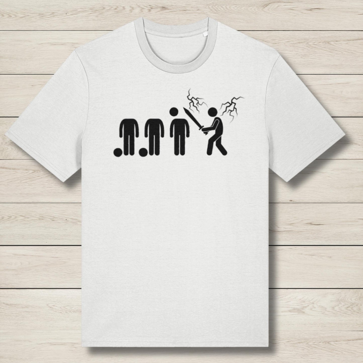 White t-shirt with black graphic design on a wooden surface