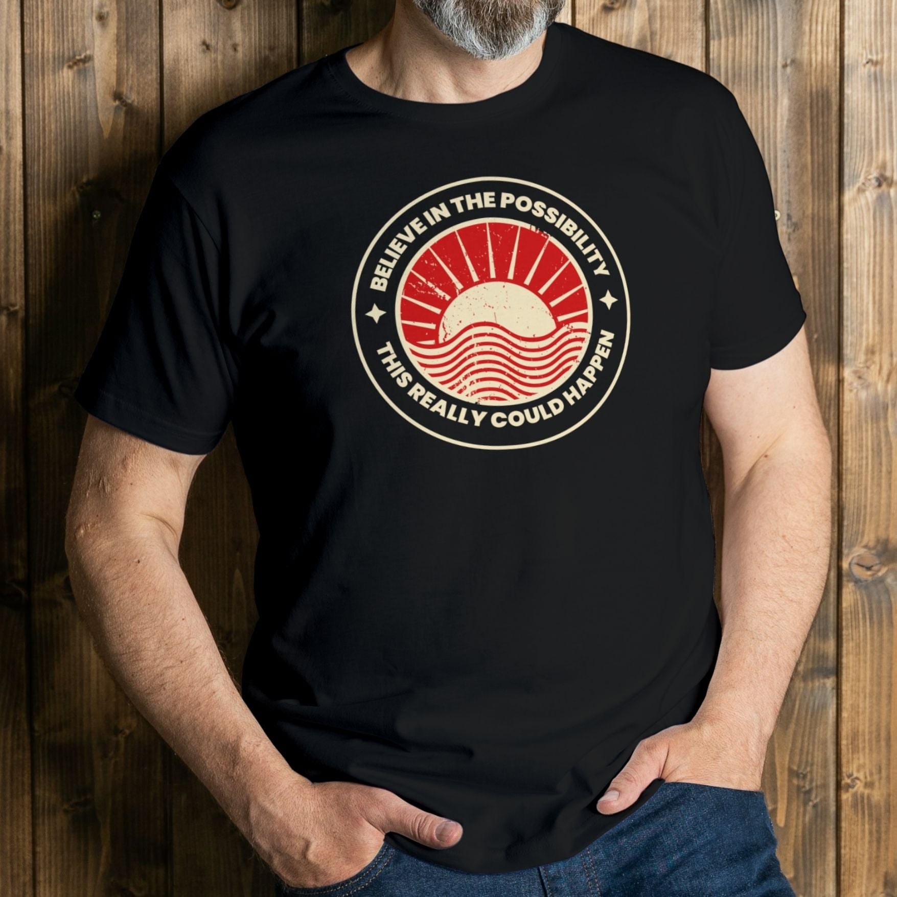 man wearing believe in the poss sunrise graphic tee