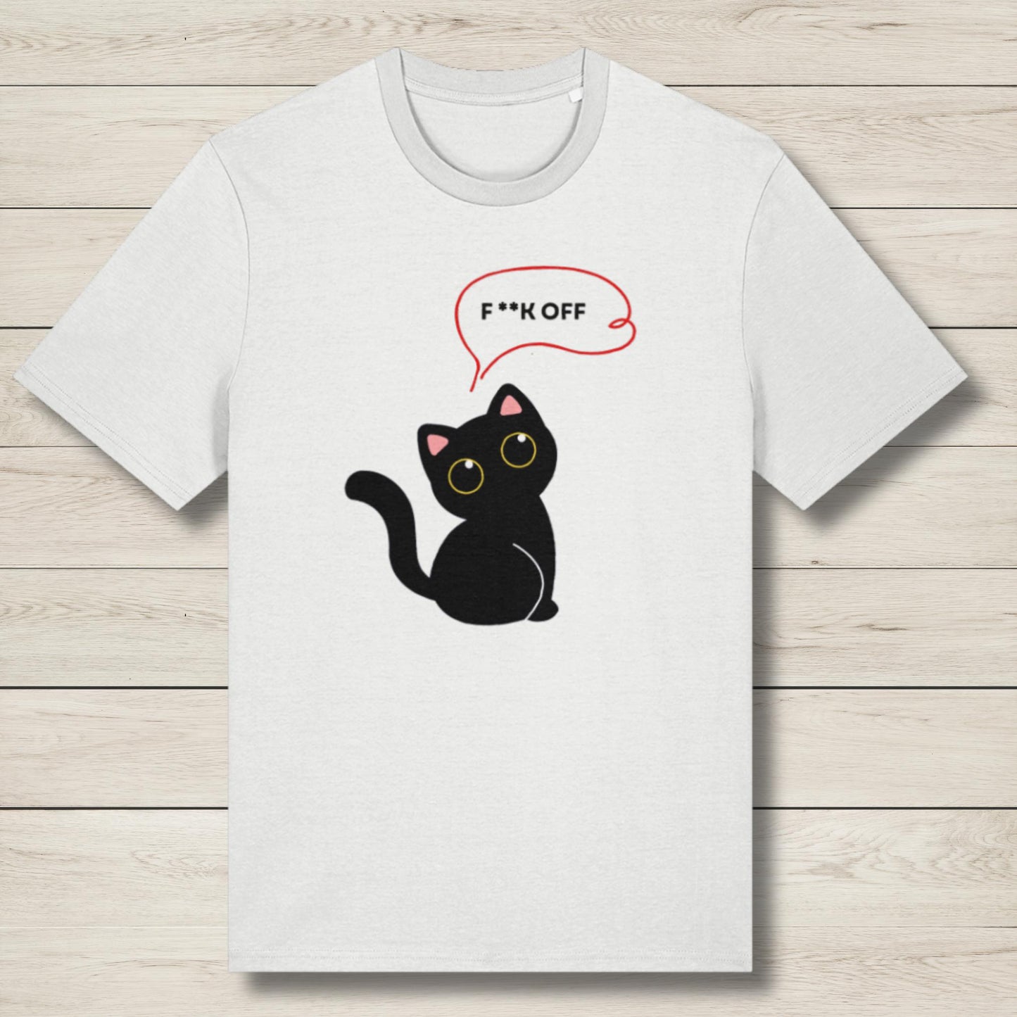 White t-shirt with a black cat graphic and 'F*** OFF' speech bubble on a wooden surface