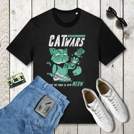 Black t-shirt with 'Cat Wars' graphic design on a wooden surface with jeans, sneakers, and sunglasses.