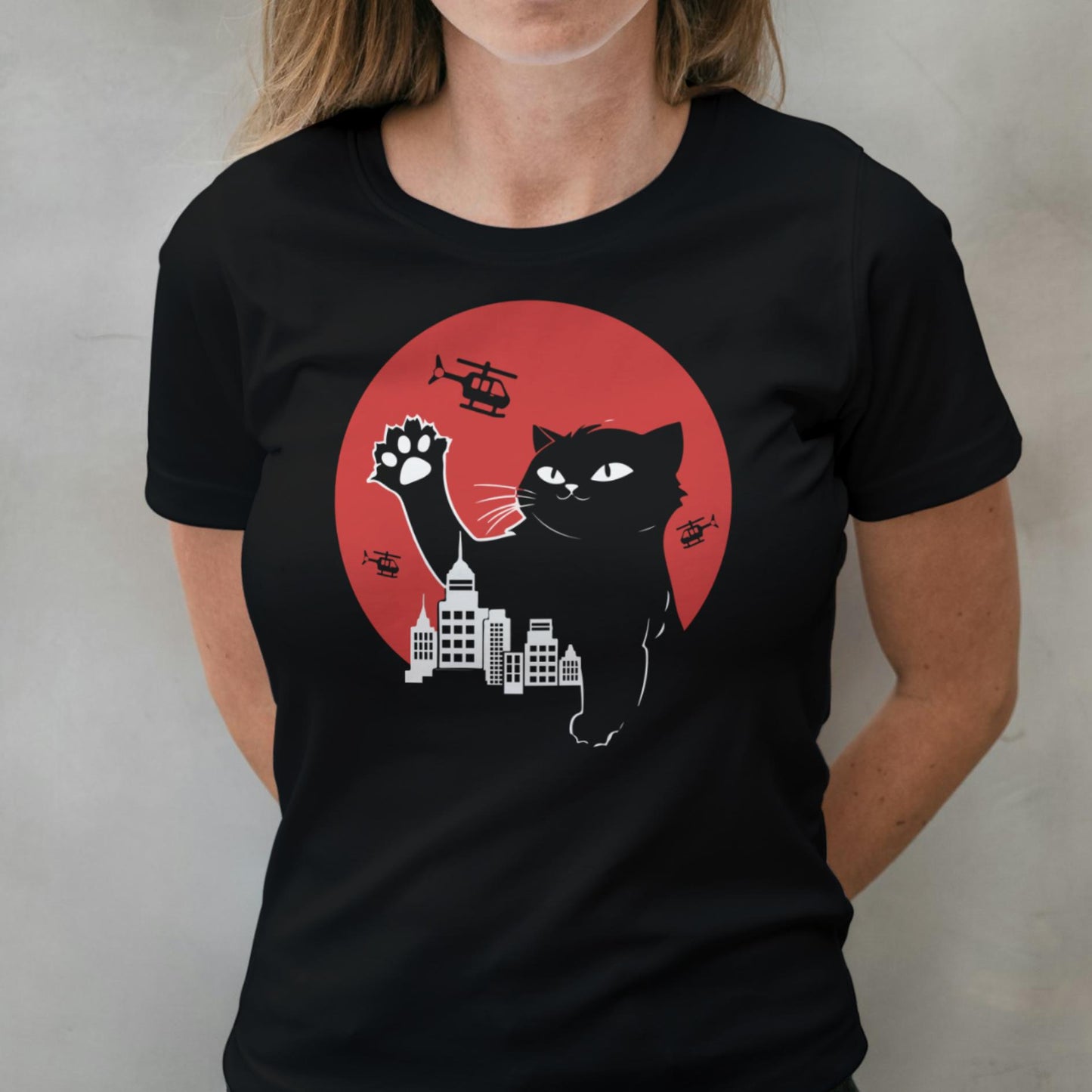 woman wearing cat zilla graphic tee