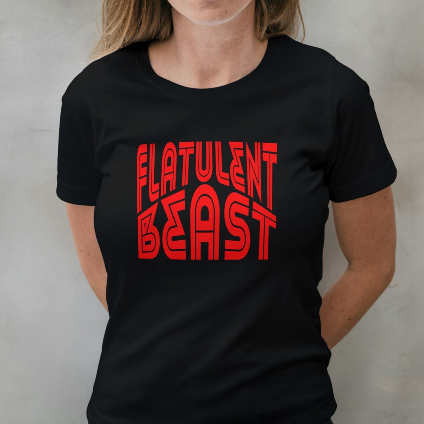 woman wearing red on black flatulent beast graphic tee