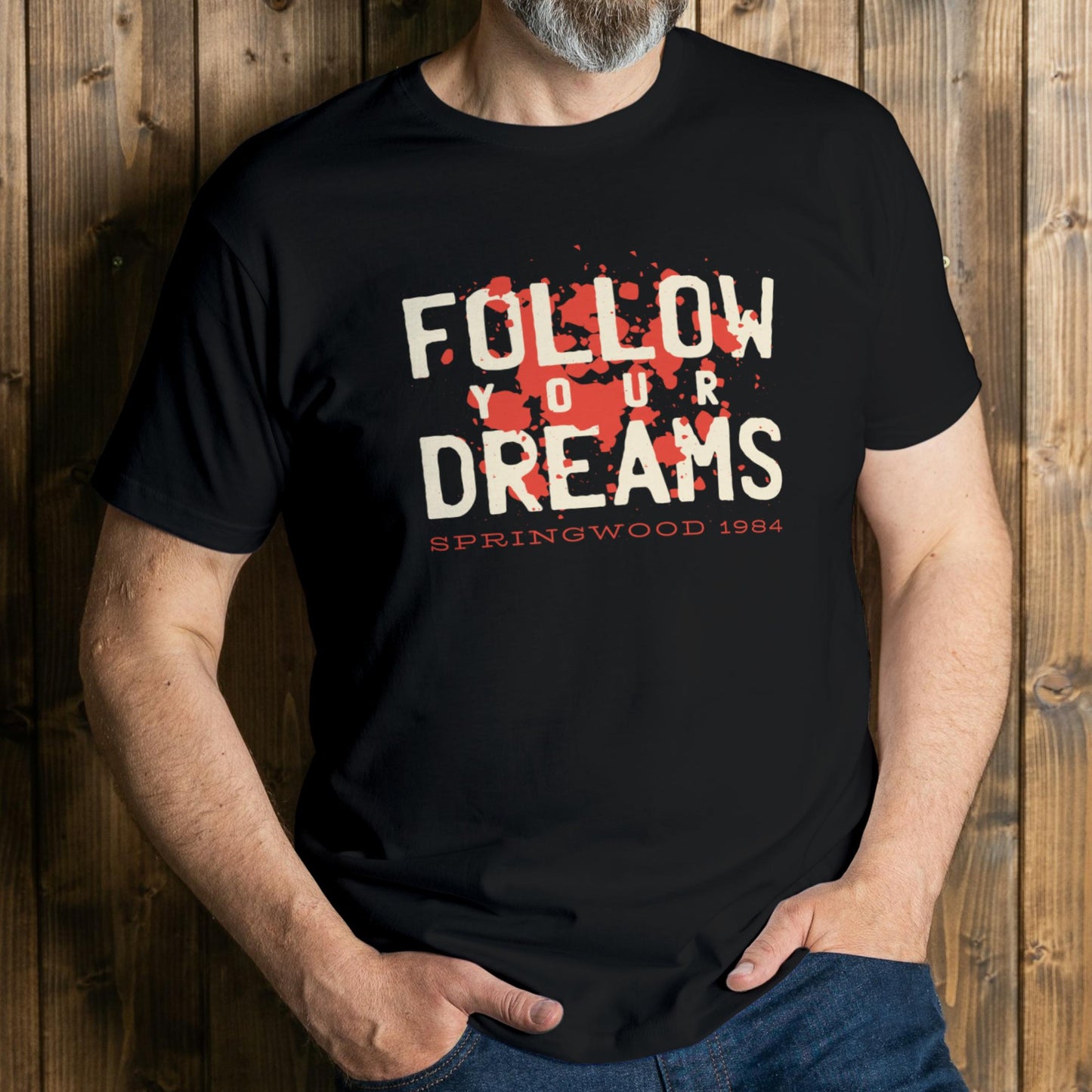 man wearing follow your dream graphic tee
