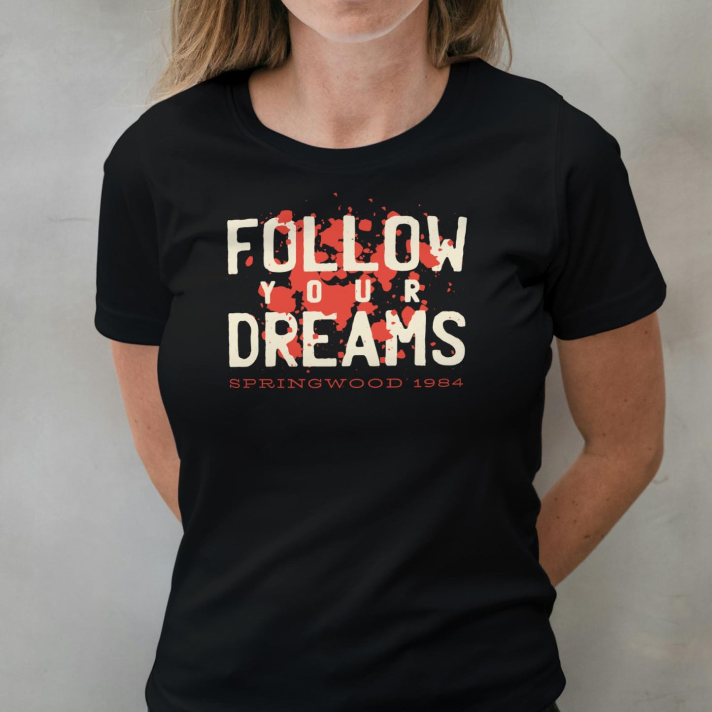 woman wearing follow your dreams graphic tee