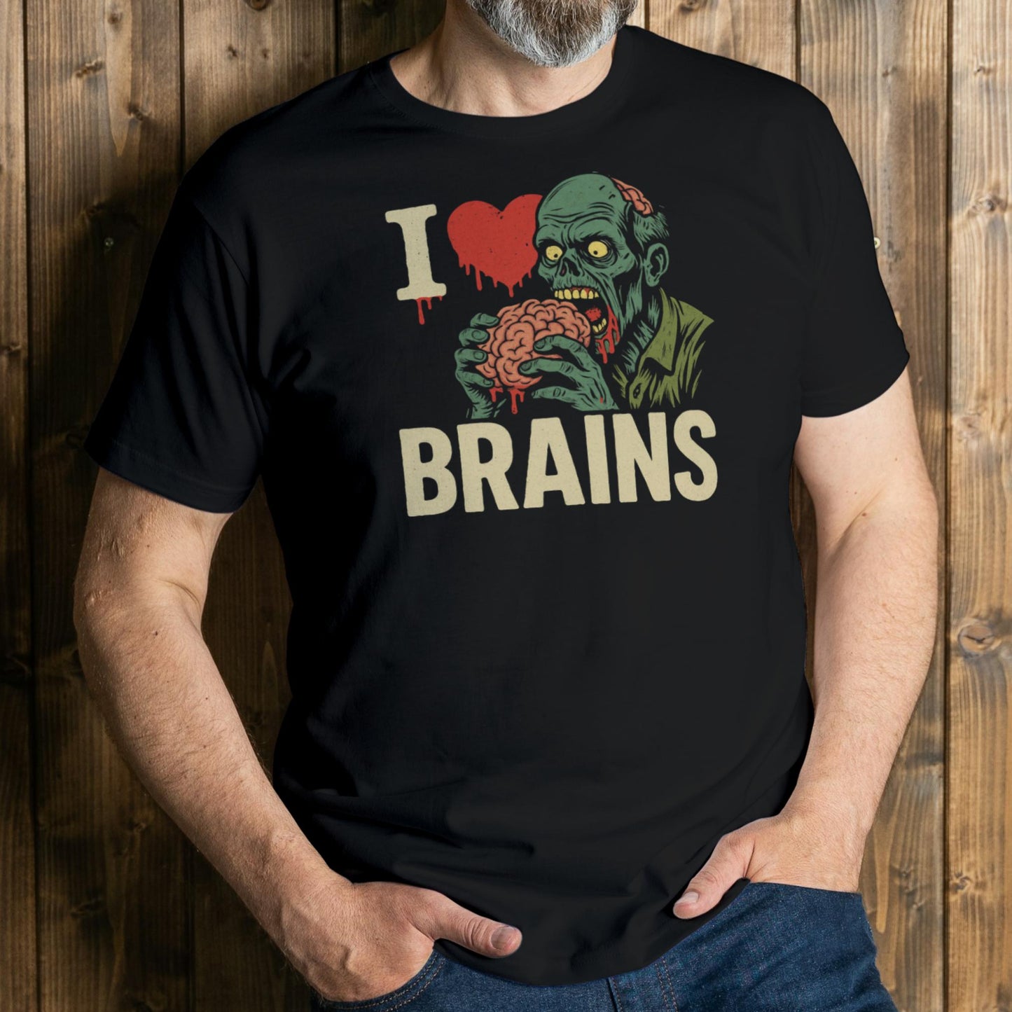 Person wearing a black t-shirt with a zombie graphic and 'I ❤️ BRAINS' text against a wooden background.