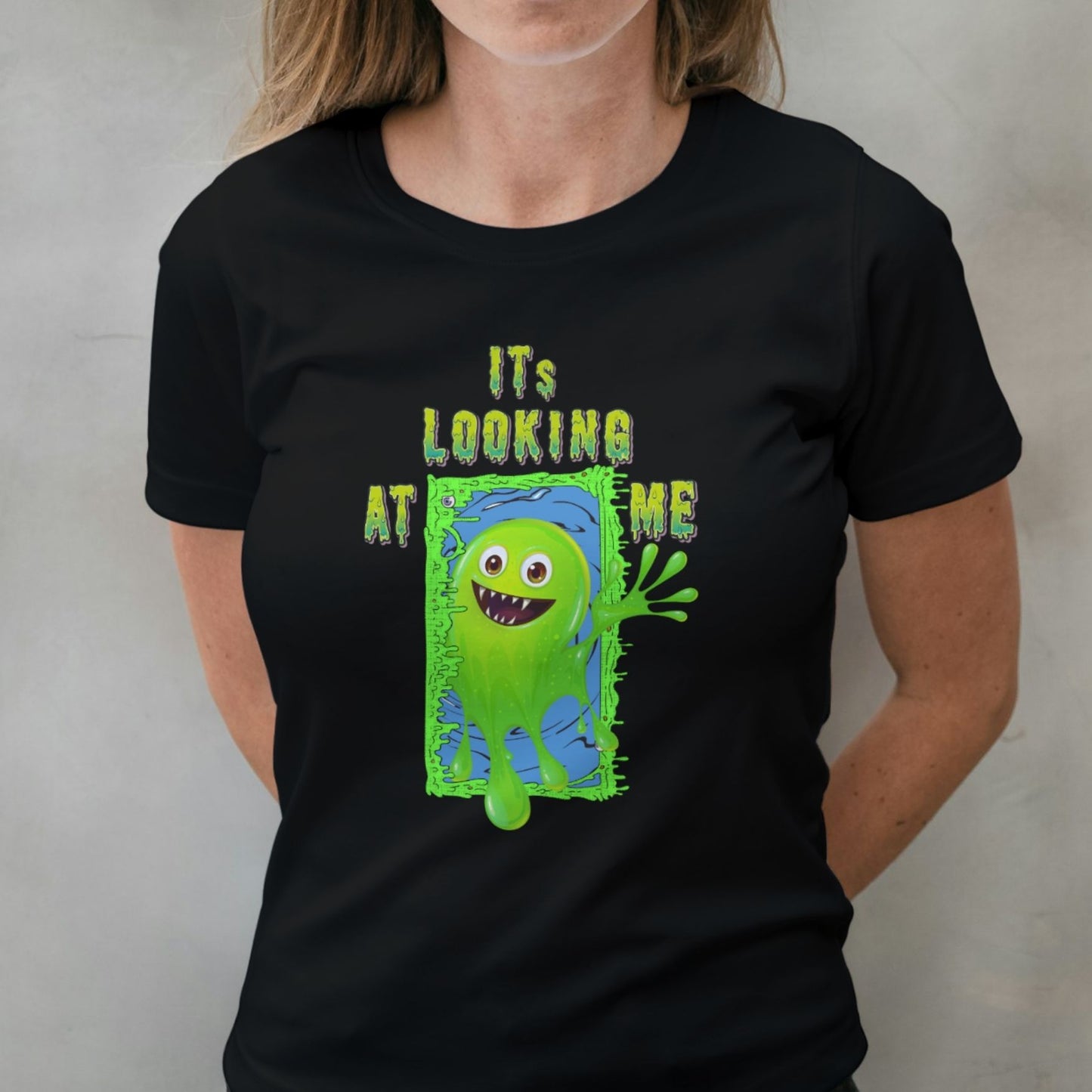 woman wearing its looking at me graphic tee