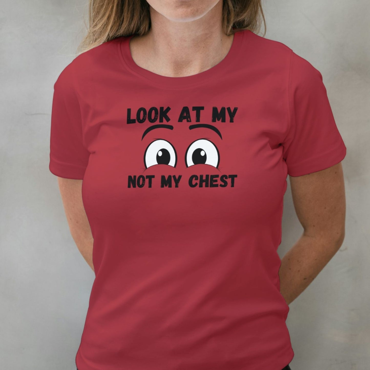woman wearing look at my eyes graphic tee