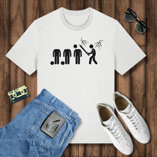 White t-shirt with graphic design, blue jeans, white sneakers, and sunglasses on a wooden surface