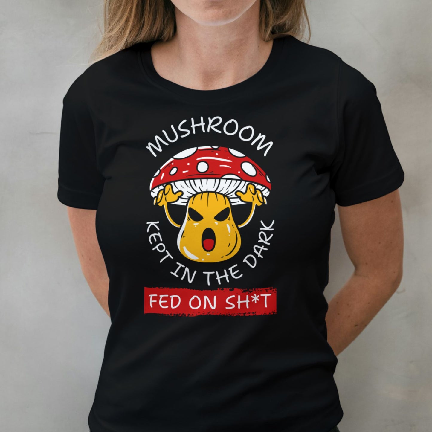 woman wearing kept in the dark graphic tee