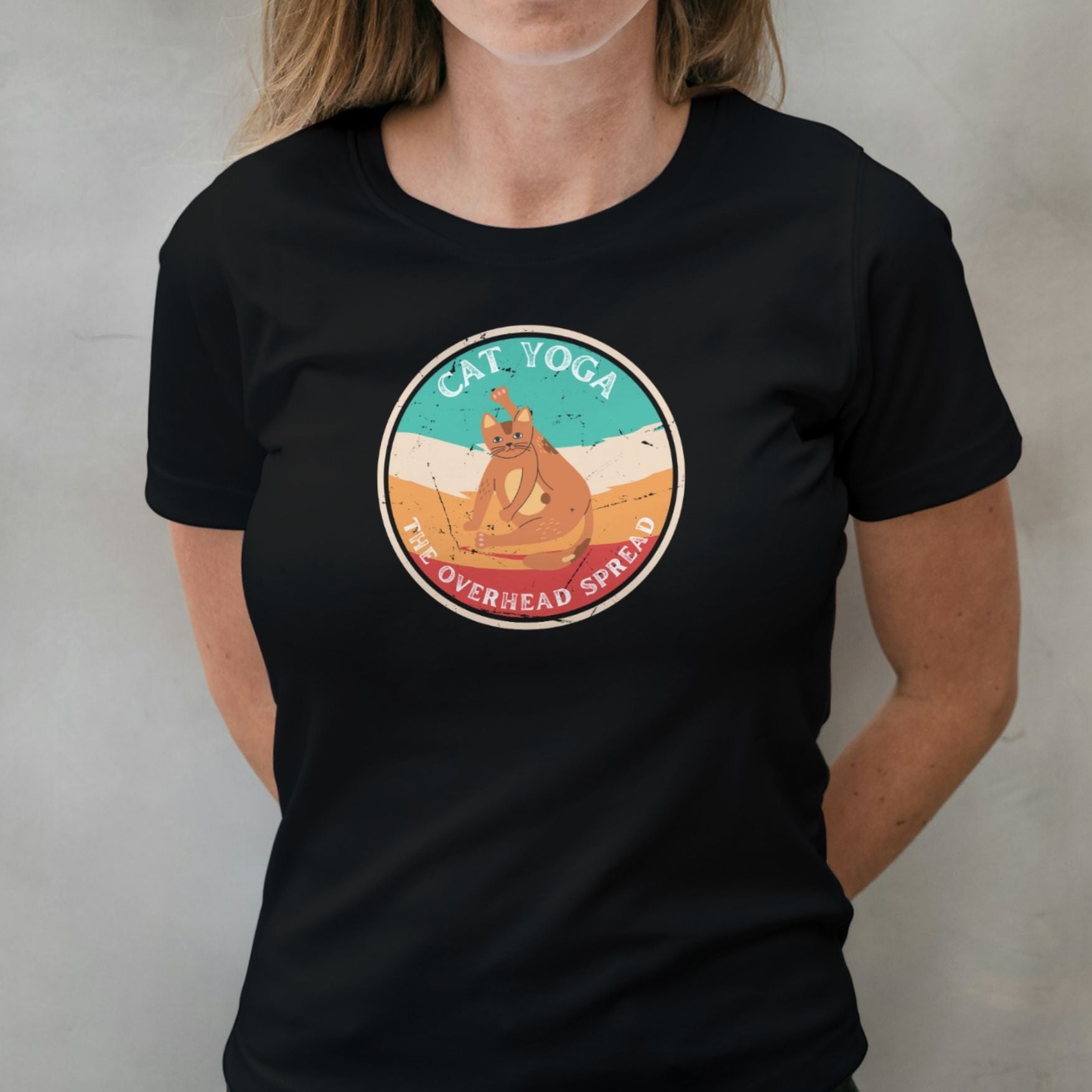 woman wearing overhead spread graphic tee