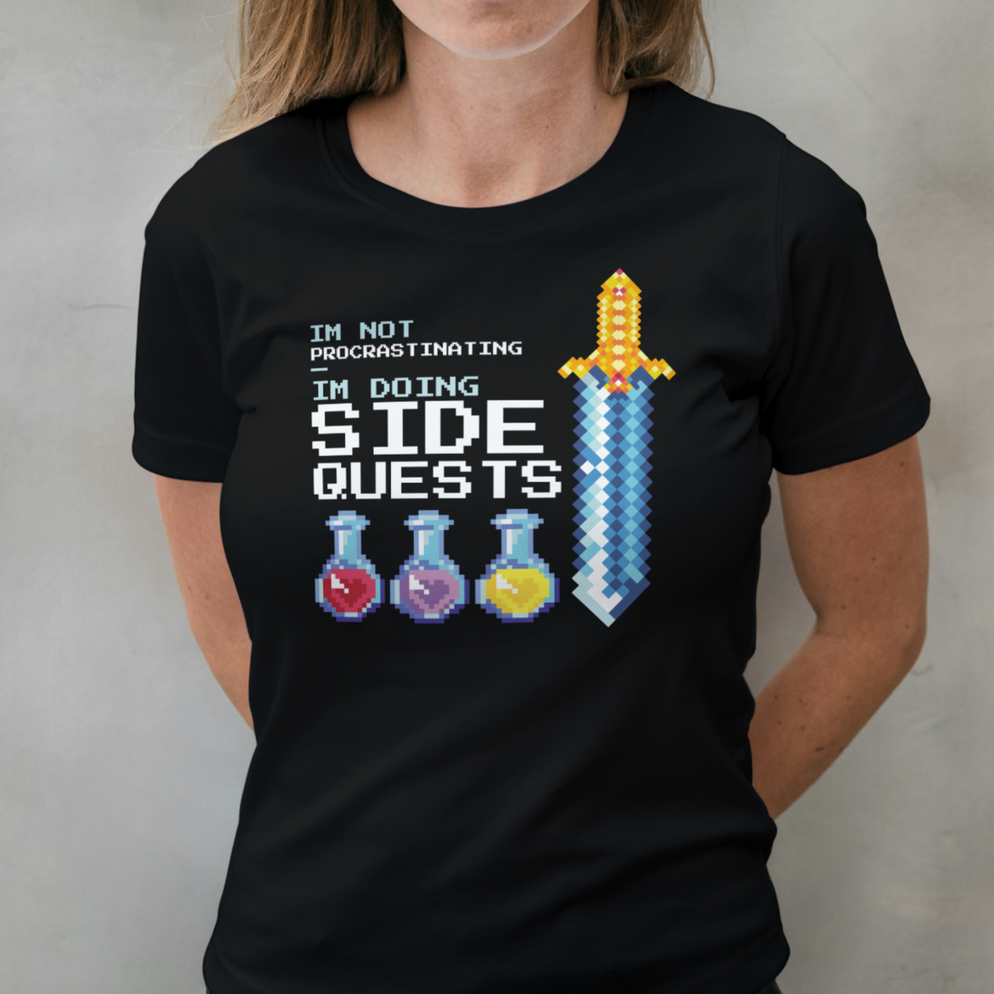 woman wearing side quests graphic tee