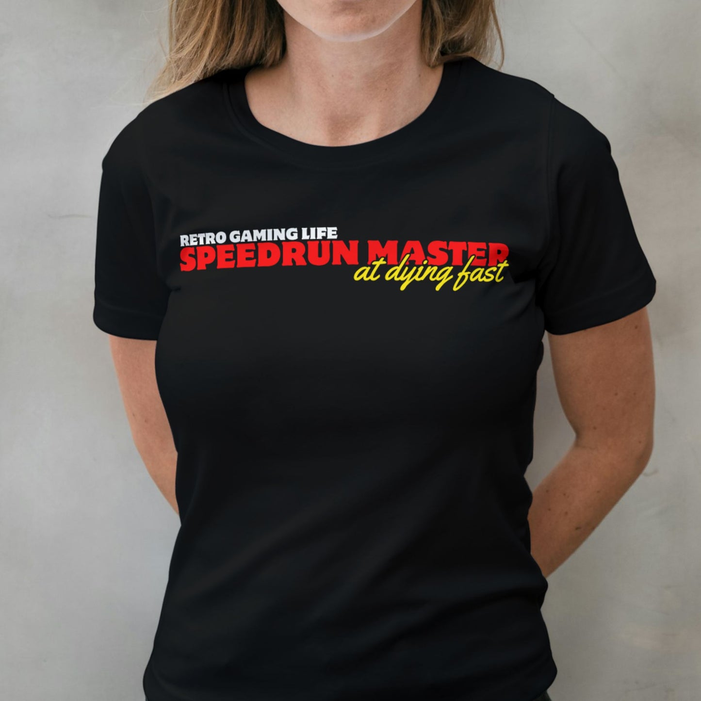 woman wearing speedrun master graphic tee