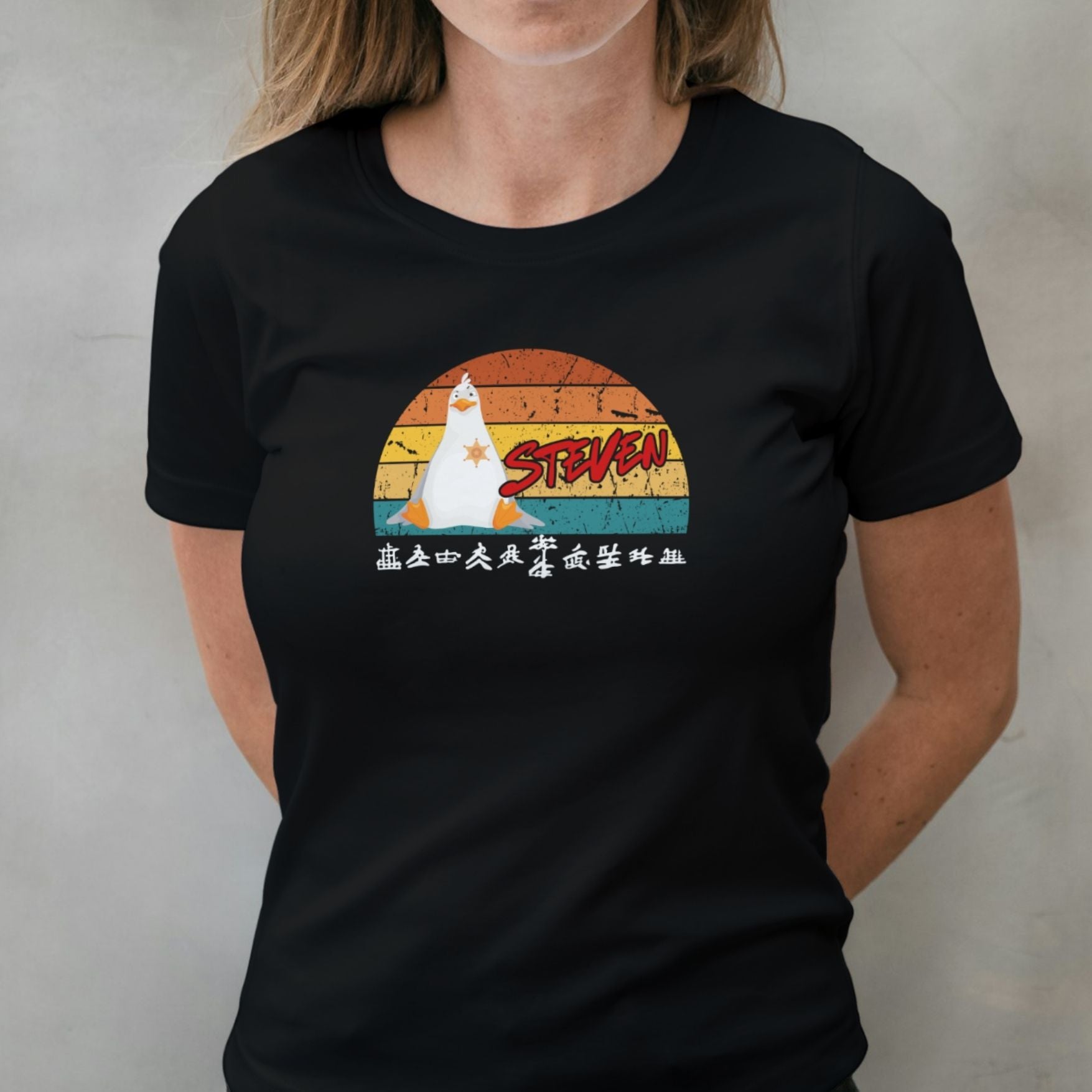 woman wearing steven seagull graphic tee