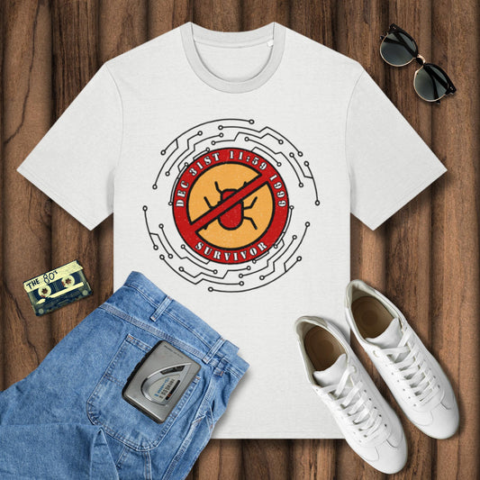 White t-shirt with graphic design on a wooden surface, surrounded by jeans, sneakers, sunglasses, and a cassette tape.