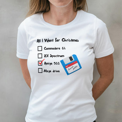 Person wearing a white t-shirt with a retro computer-themed design.