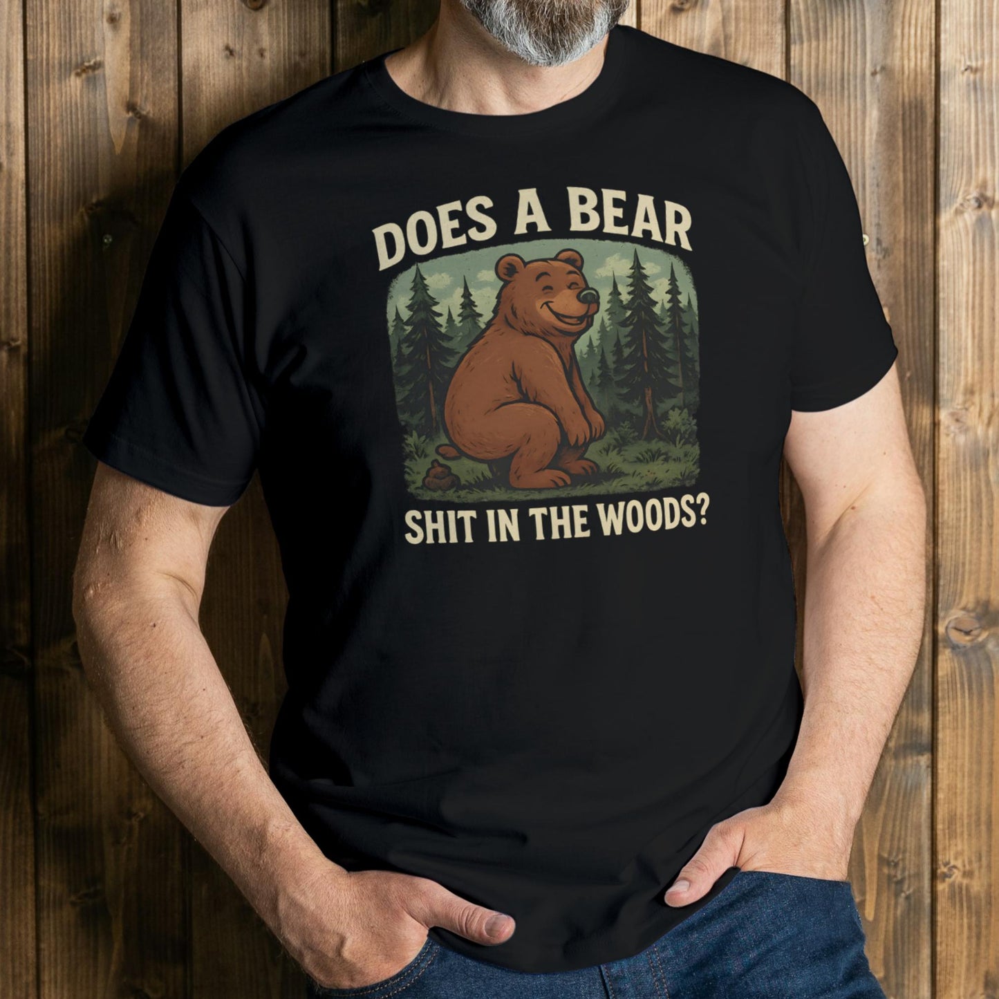 Person wearing a black t-shirt with a bear graphic and text against a wooden background