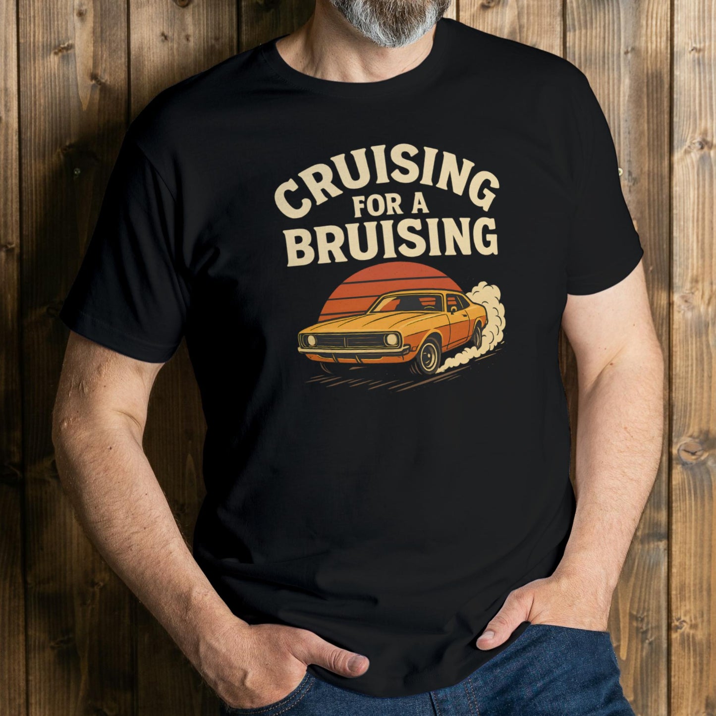 Person wearing a black t-shirt with a graphic design and text against a wooden background