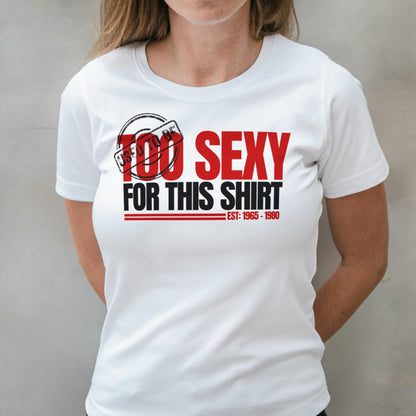 White t-shirt with red and black text design worn by a person against a plain background