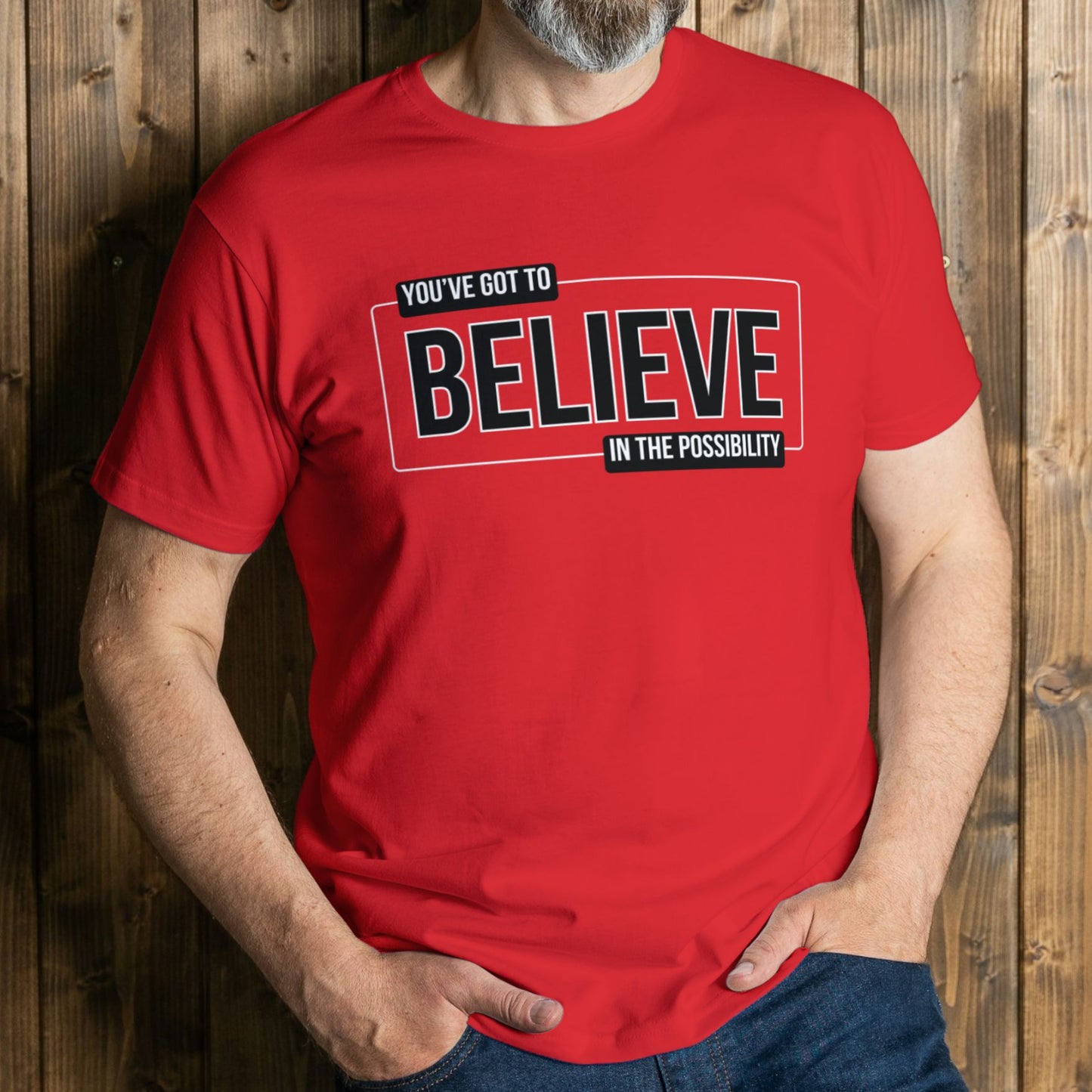 man wearing believe red graphic tee 