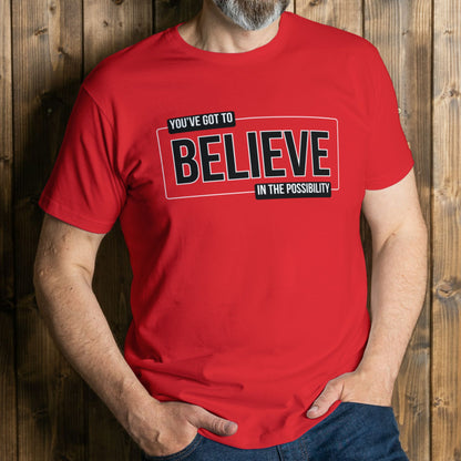 man wearing believe red graphic tee 