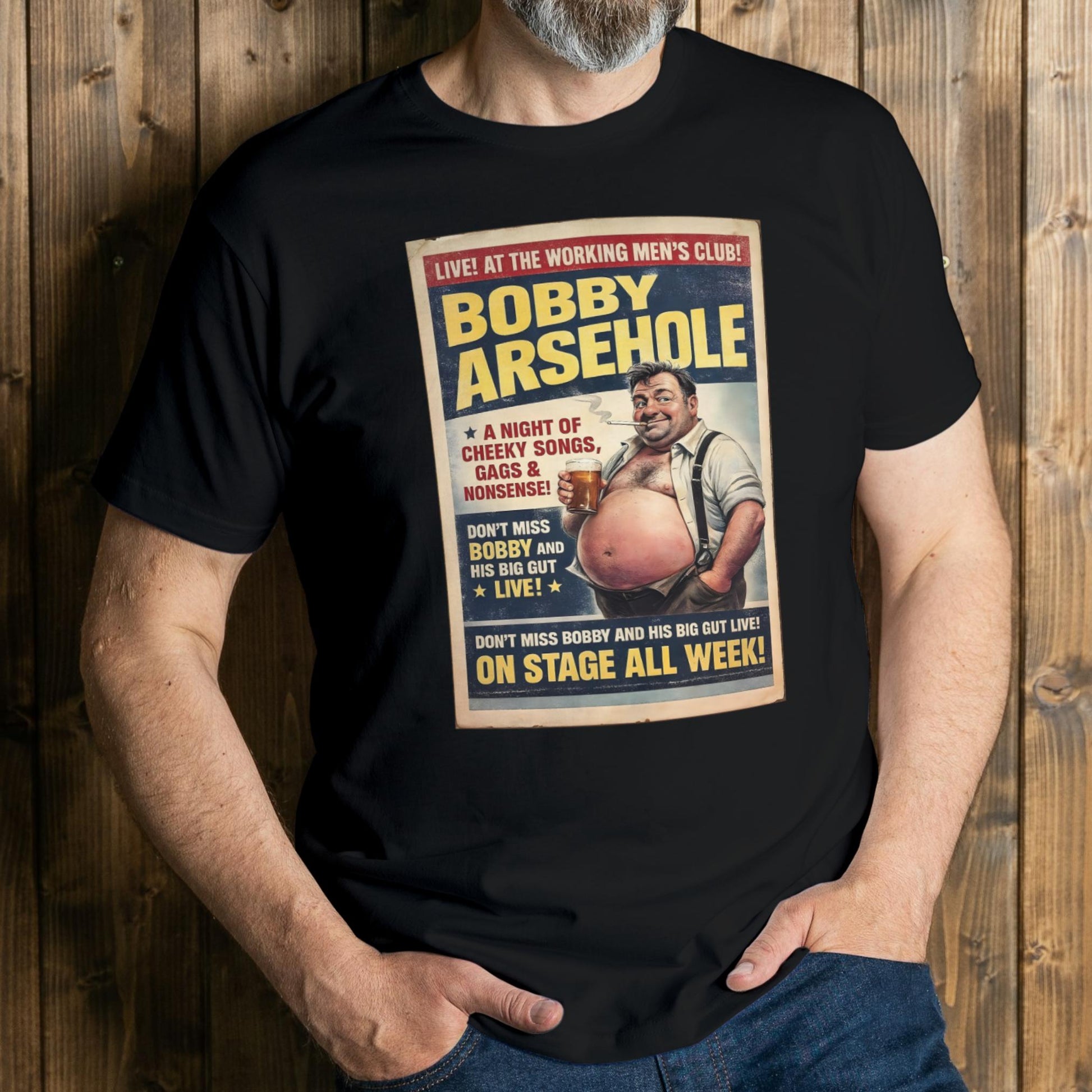 Person wearing a black t-shirt with a graphic design featuring a man and text.