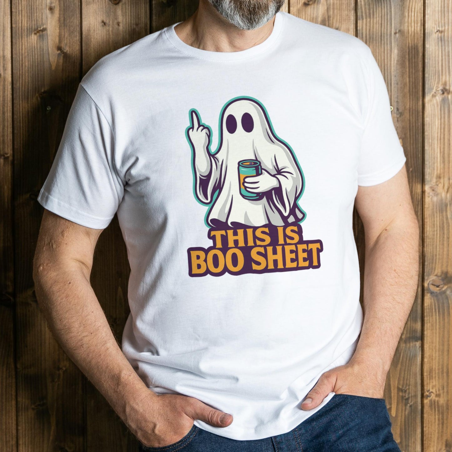 Person wearing a white t-shirt with a ghost graphic and text against a wooden background