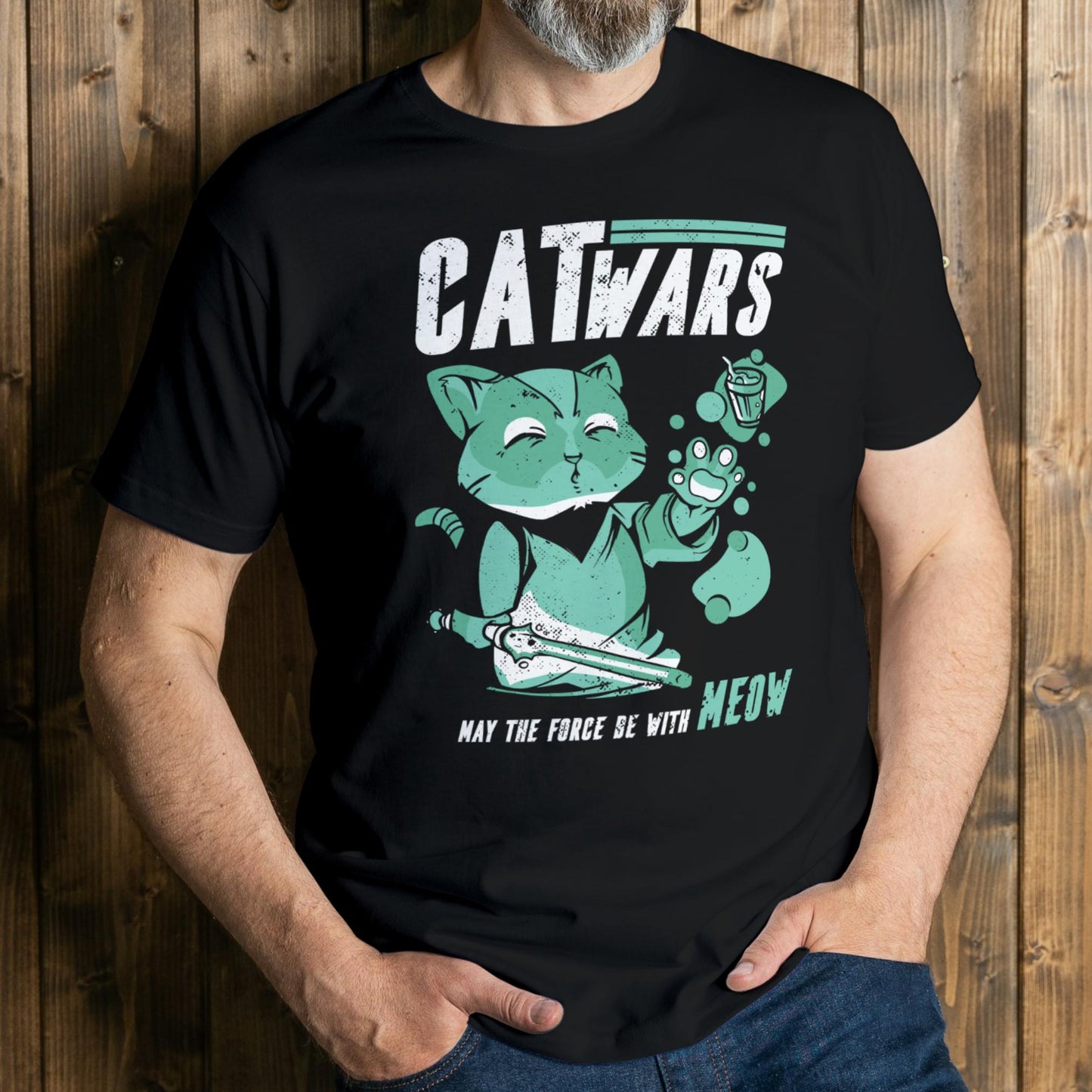man wearing cat wars graphic tee