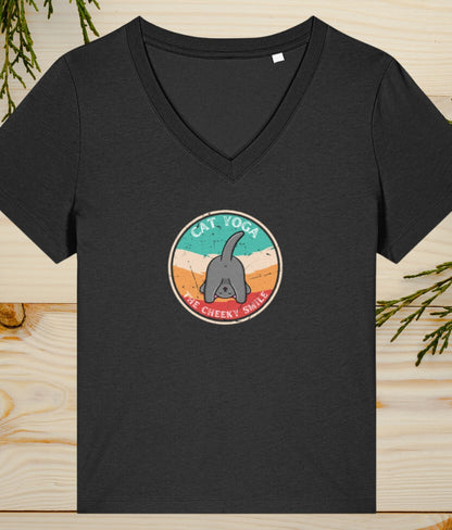 cat doing yoga with its head between its legs on a black womens v neck t shirt