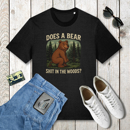 Black t-shirt with bear graphic and text, paired with jeans, sneakers, and sunglasses on a wooden surface.