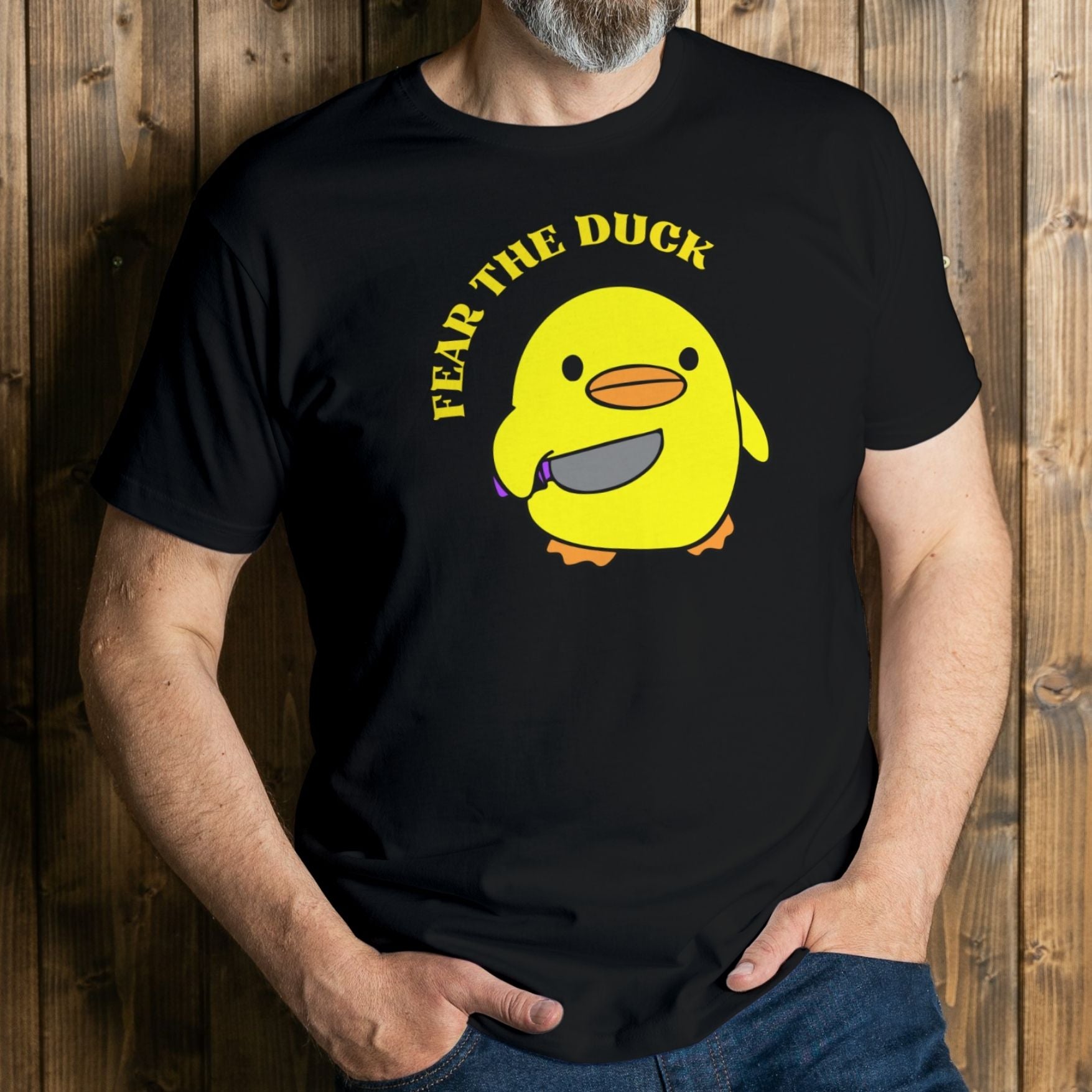 man wearing fear the duck graphic tee