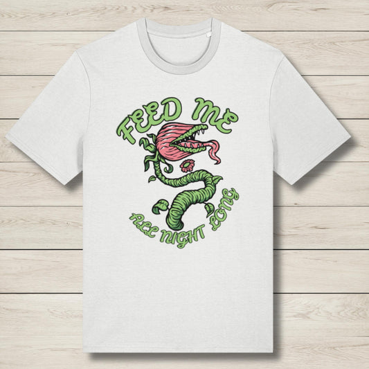 White t-shirt with a graphic design of a venus fly trap and text on a wooden surface