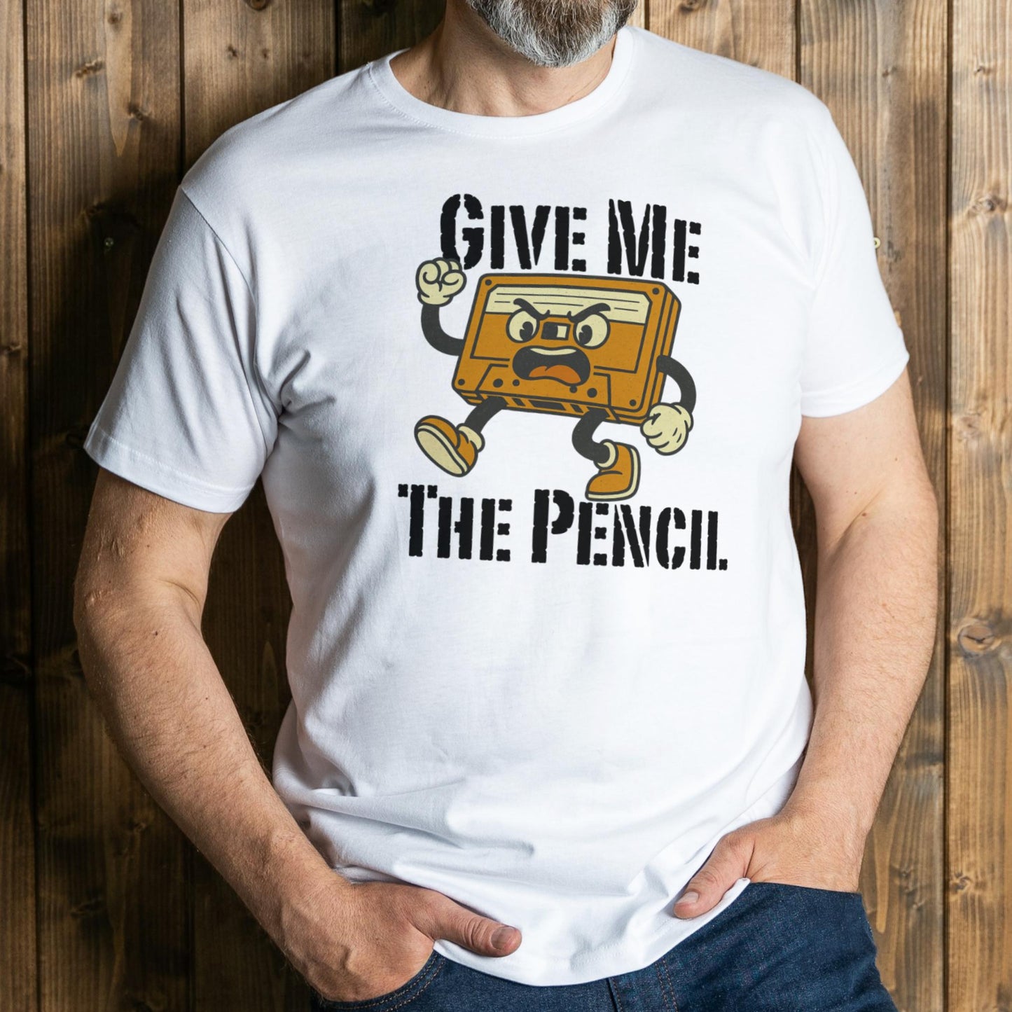 Person wearing a white t-shirt with a graphic design and text against a wooden background
