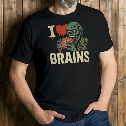 Person wearing a black t-shirt with a zombie graphic and 'I ❤️ BRAINS' text against a wooden background.