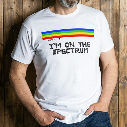 man wearing i'm on the spectrum graphic tee