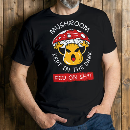 man wearing mushroom kept in the dark graphic tee