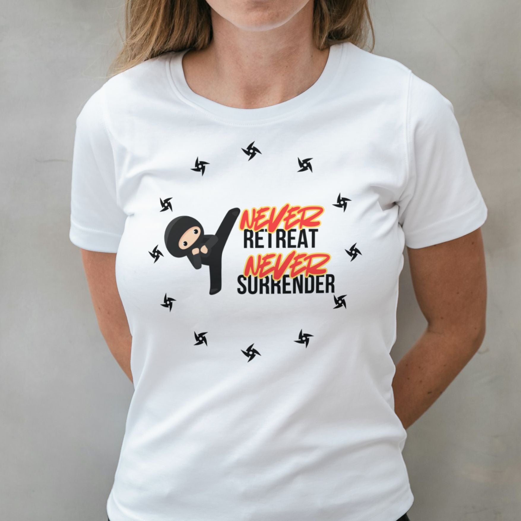 woman wearing never retreat never surrender graphic tee