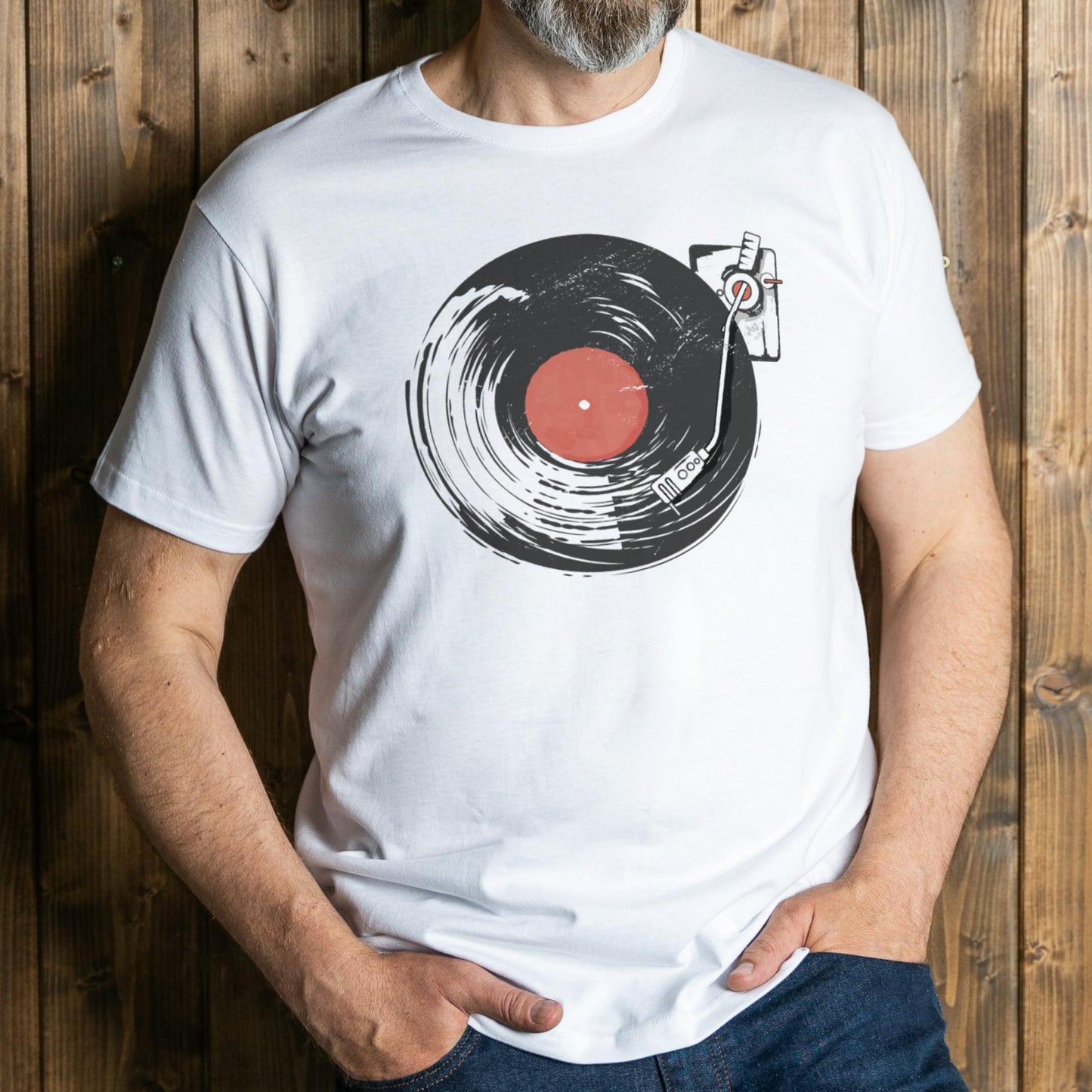 man wearing vintage record player on white graphic tee