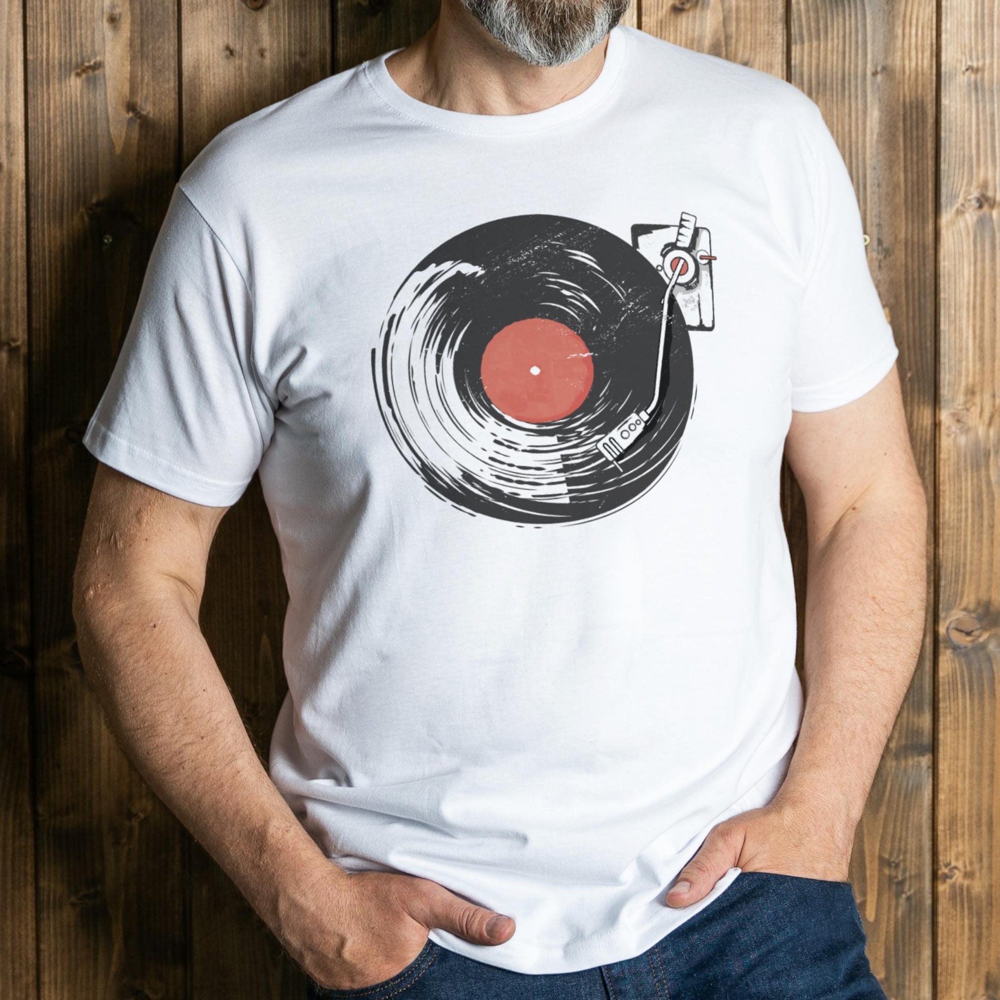 man wearing vintage record player on white graphic tee
