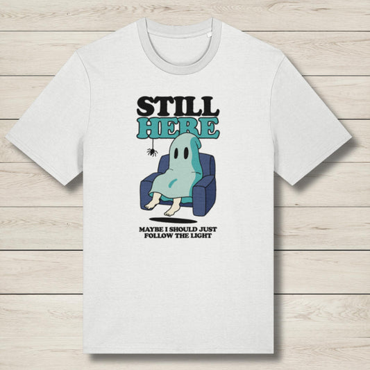 White t-shirt with a graphic of a ghost in an armchair and text on a wooden surface