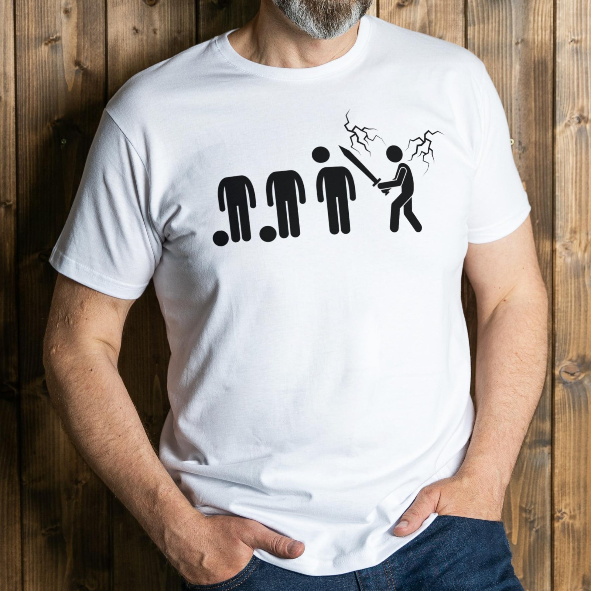 Person wearing a white t-shirt with black graphic design against a wooden background