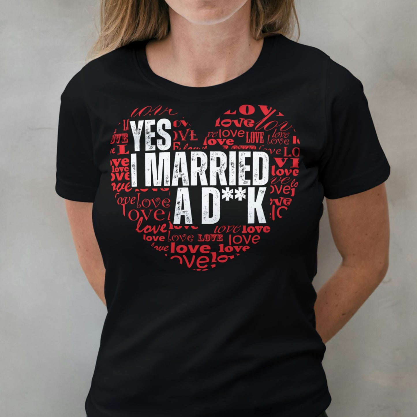Person wearing a black t-shirt with red and white text design.