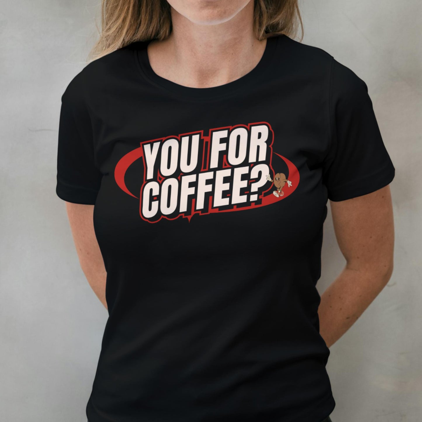 Person wearing a black t-shirt with 'YOU FOR COFFEE?' text design.